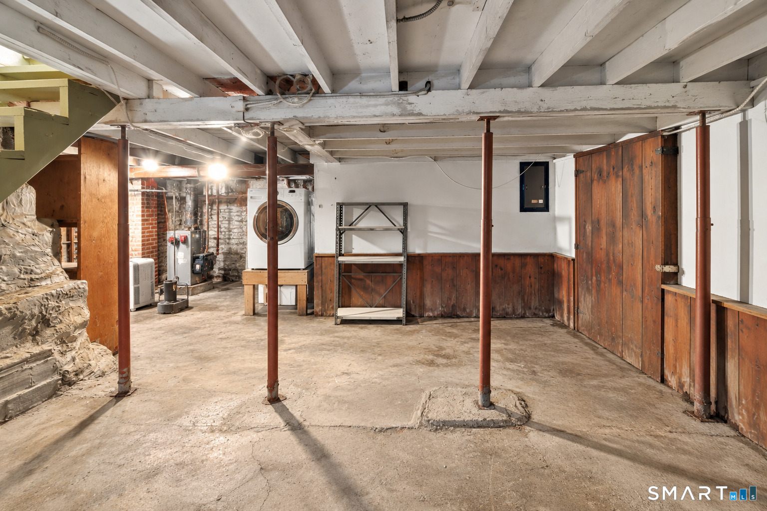 606 North Madison Road Guilford, CT 06437 - Photo 26 of 38 Unfinished lower level provides generous space for storage, workshop use and future possibilities