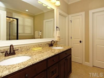 413 Redhill Road Holly Springs, NC 27540 - Photo 9 of 25 Luxury master bath with double vanity and large garden soaking tub. Master Bath/Spa