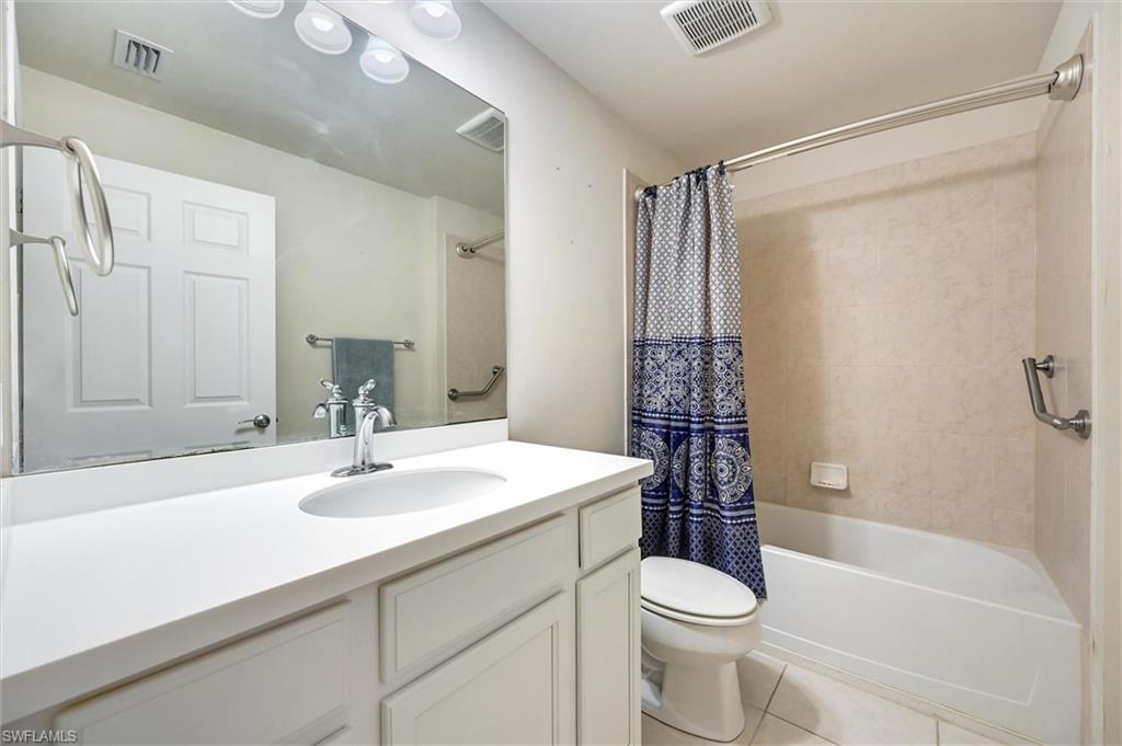 4357 Steinbeck Way Ave Maria, FL 34142 - Photo 15 of 40 a bathroom with a sink toilet and shower