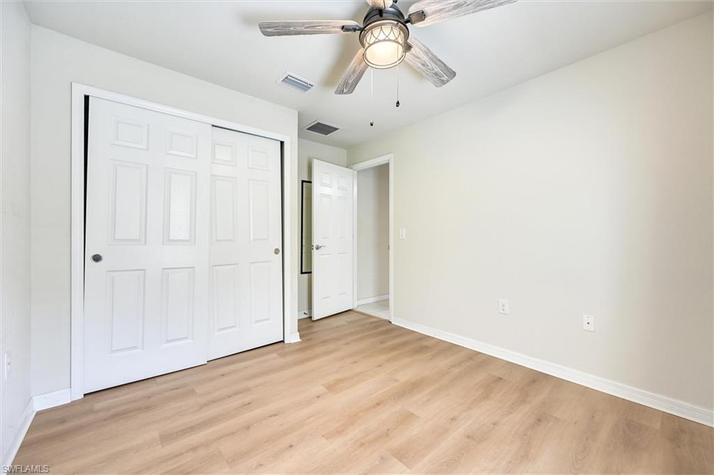 4357 Steinbeck Way Ave Maria, FL 34142 - Photo 22 of 40 wooden floor in an empty room