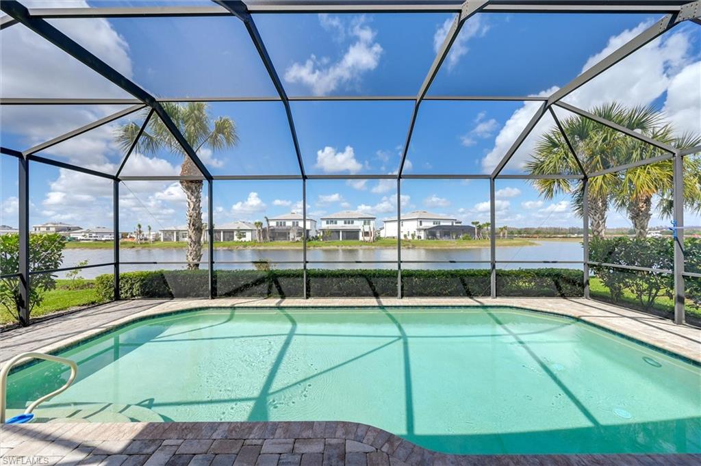 4357 Steinbeck Way Ave Maria, FL 34142 - Photo 25 of 40 a view of outdoor space with swimming pool