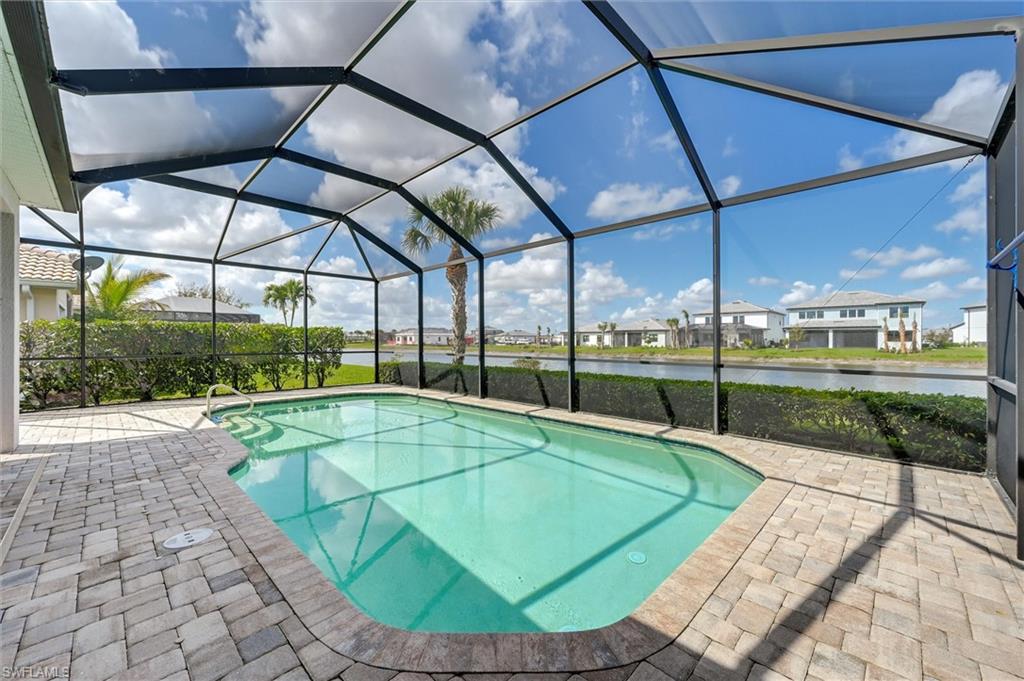 4357 Steinbeck Way Ave Maria, FL 34142 - Photo 26 of 40 a view of a swimming pool with a backyard