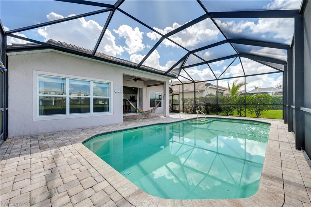 4357 Steinbeck Way Ave Maria, FL 34142 - Photo 27 of 40 a view of a swimming pool with a patio