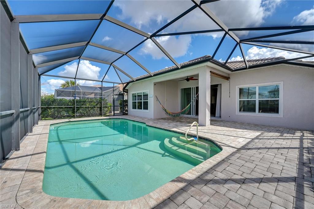 4357 Steinbeck Way Ave Maria, FL 34142 - Photo 30 of 40 a view of a house with backyard