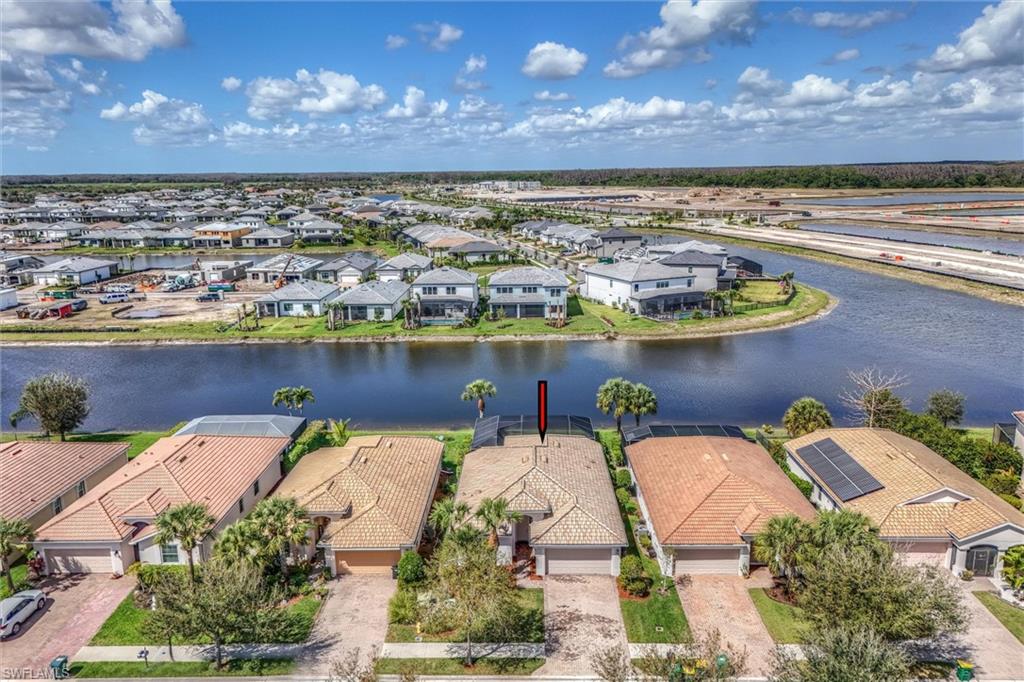 4357 Steinbeck Way Ave Maria, FL 34142 - Photo 37 of 40 a view of a swimming pool with an outdoor seating