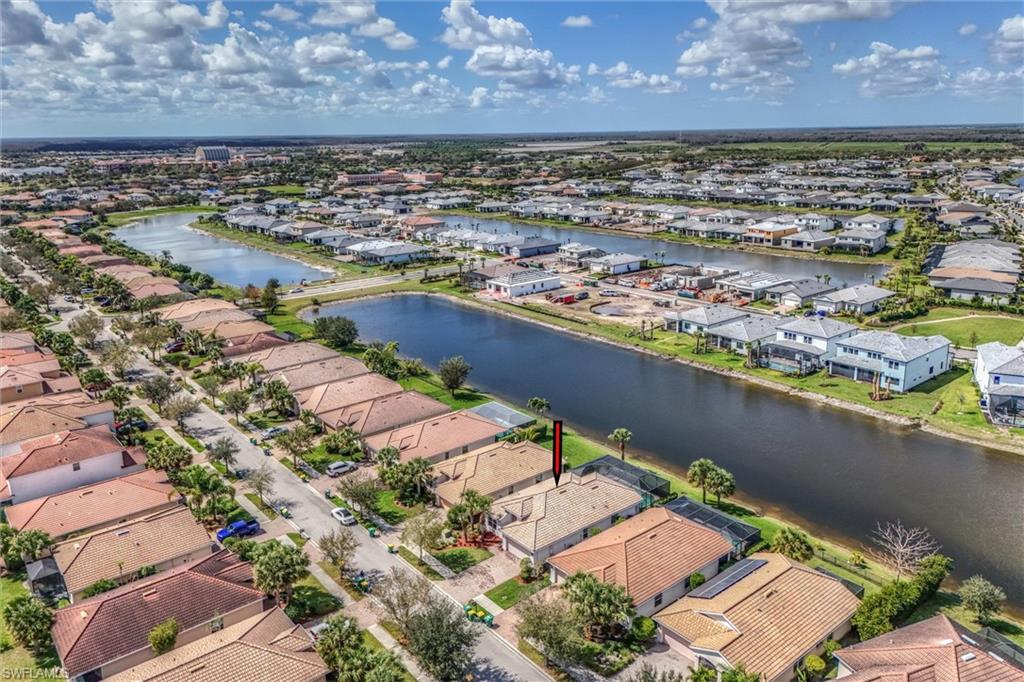 4357 Steinbeck Way Ave Maria, FL 34142 - Photo 38 of 40 an aerial view of residential houses with outdoor space