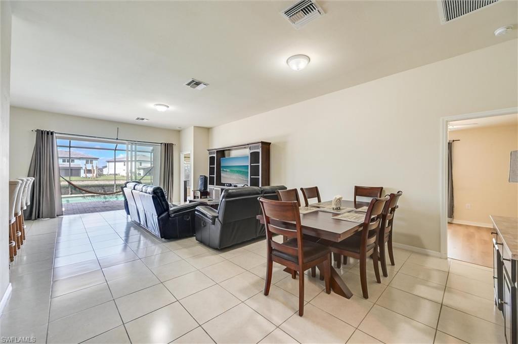4357 Steinbeck Way Ave Maria, FL 34142 - Photo 6 of 40 a view of a dining room with furniture