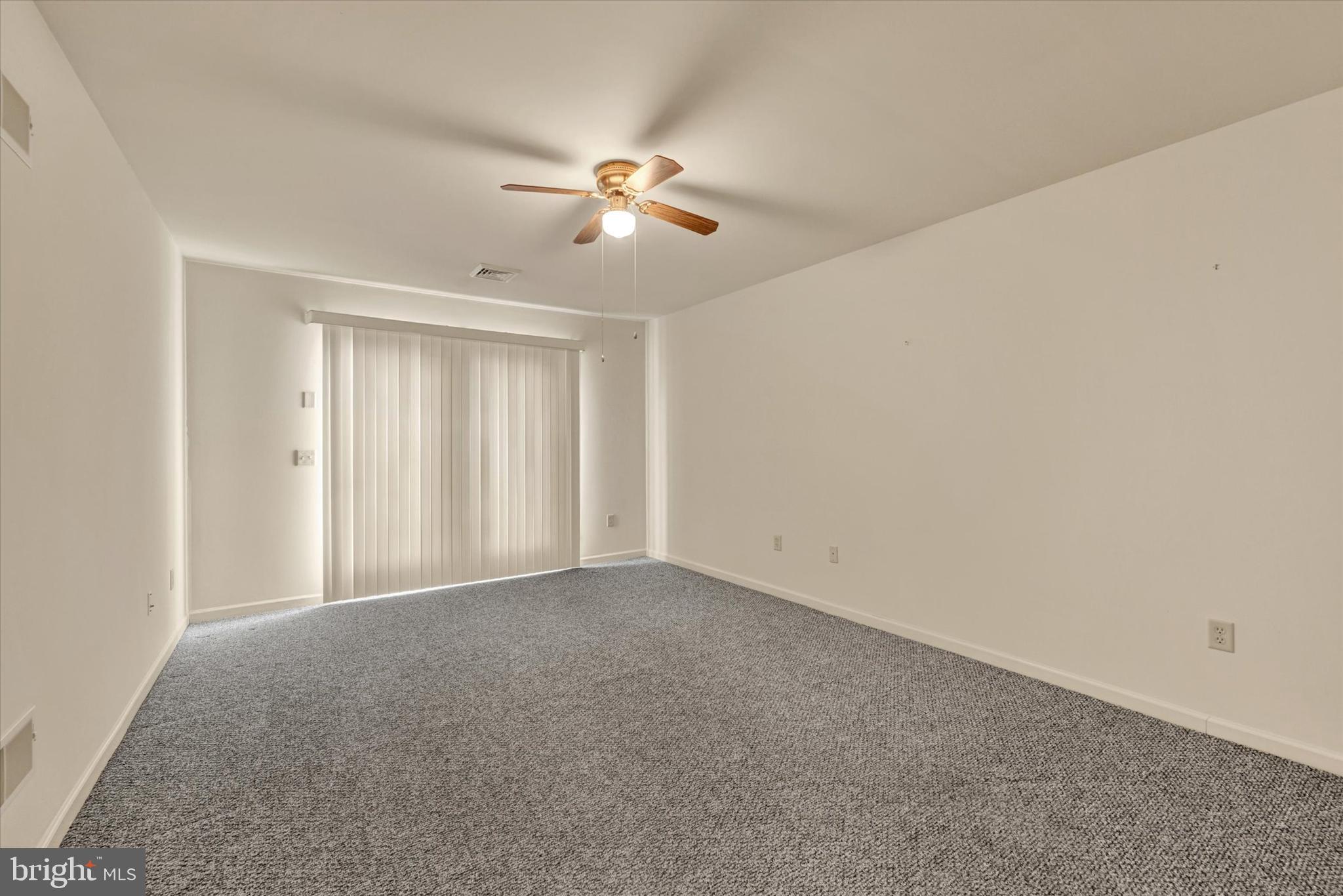 116 Furlong Way Red Lion, PA 17356 - Photo 16 of 28 BEDROOM 2 /DEN W/SLIDER TO PATIO