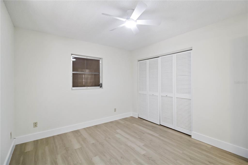 1028 Lillian Street Venice, FL 34285 - Photo 12 of 30 wooden floor in an empty room