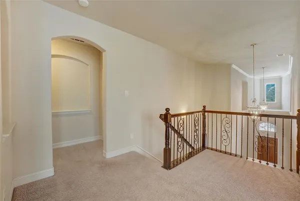 a view of a hallway with entryway