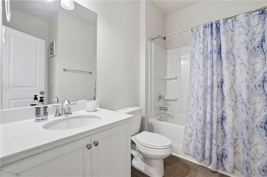175 Paxton Lane Jefferson, GA 30549 - Photo 25 of 39 a bathroom with a sink a toilet and shower