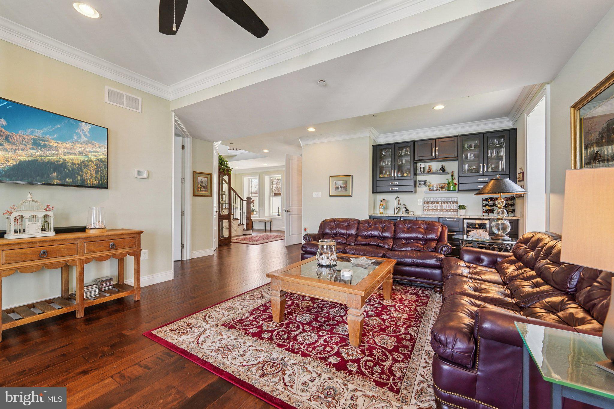 424 Katherine Avenue Baltimore, MD 21221 - Photo 12 of 77 a living room with furniture and a wooden floor