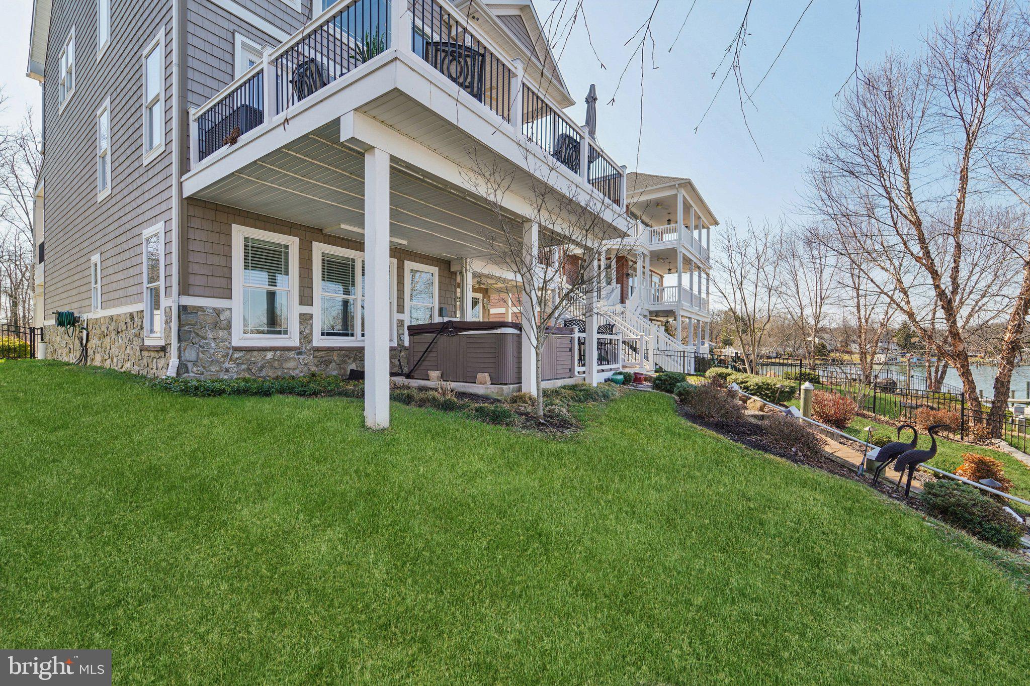 424 Katherine Avenue Baltimore, MD 21221 - Photo 16 of 77 a view of a house with a yard and sitting area