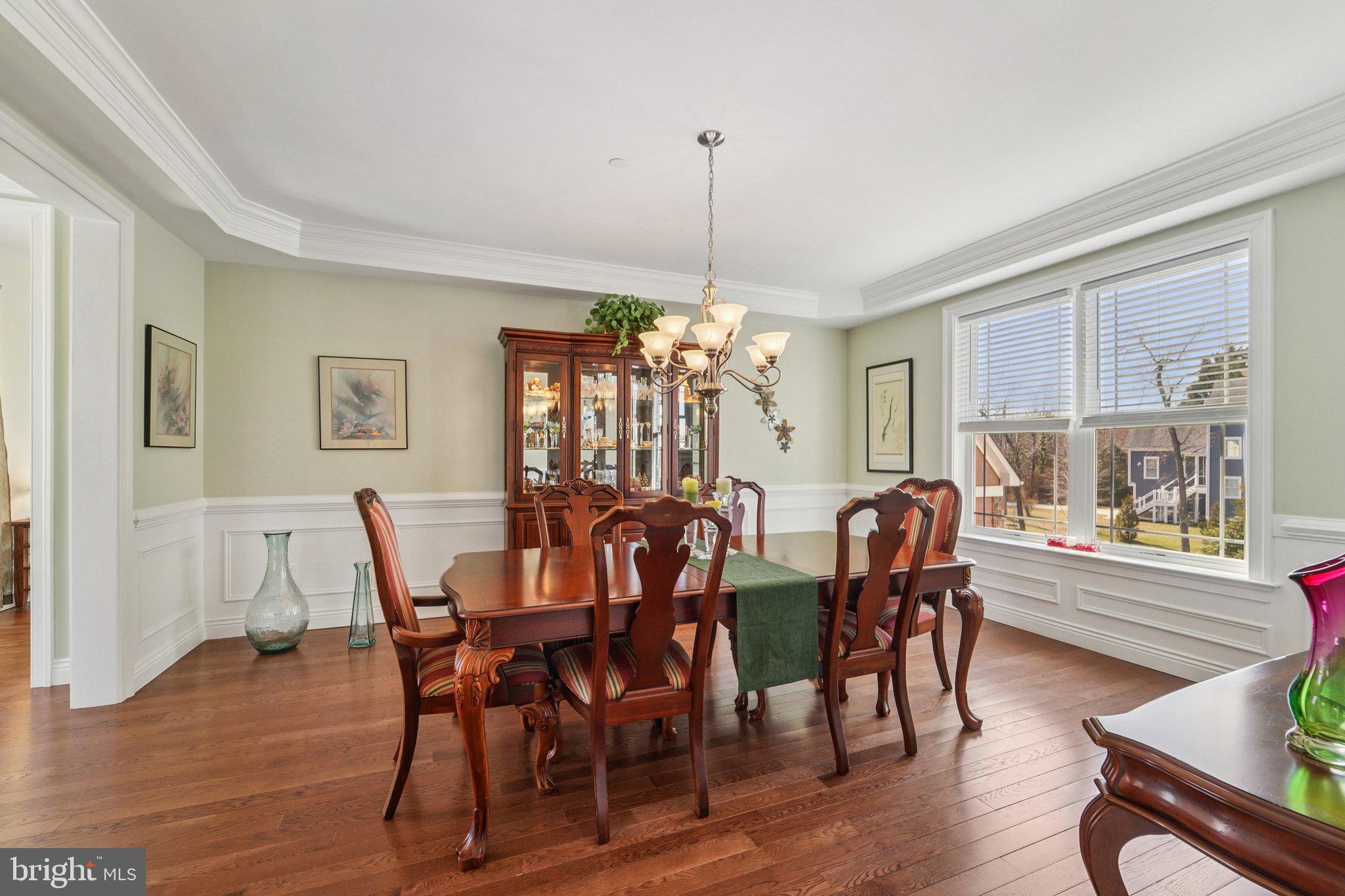 424 Katherine Avenue Baltimore, MD 21221 - Photo 24 of 77 a view of a dining room with furniture window and wooden floor
