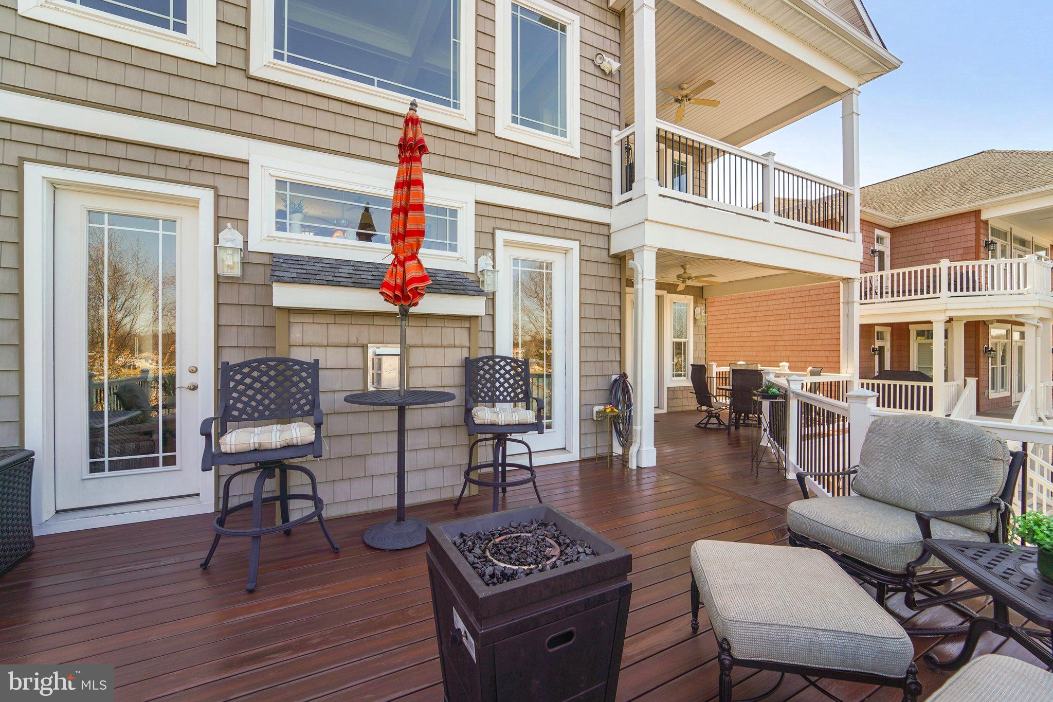424 Katherine Avenue Baltimore, MD 21221 - Photo 35 of 77 a outdoor living room with furniture and wooden floor