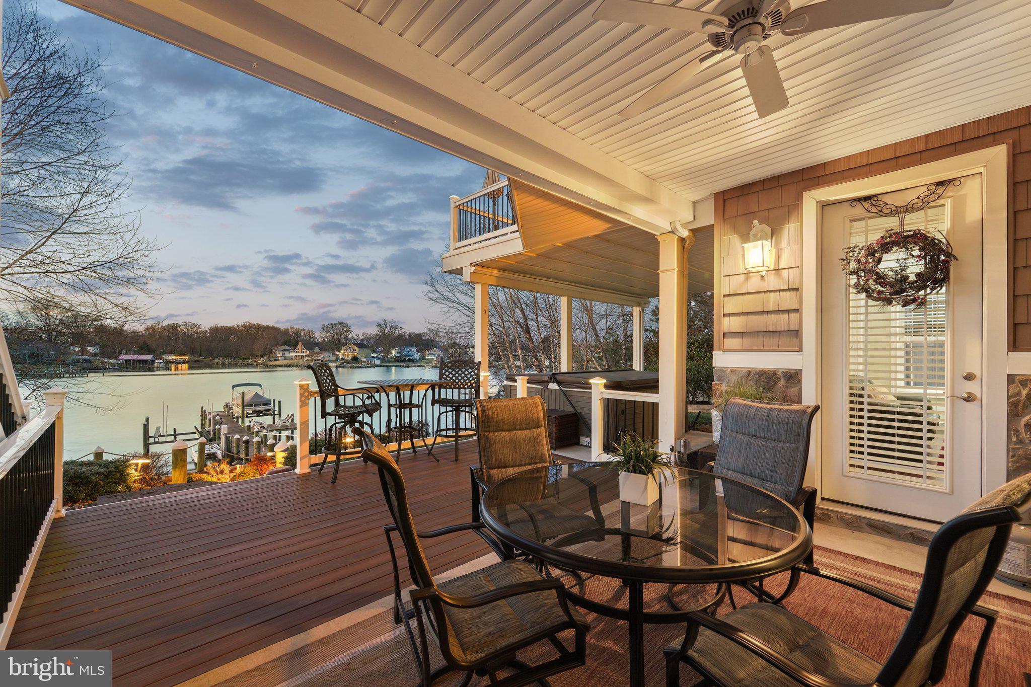 424 Katherine Avenue Baltimore, MD 21221 - Photo 62 of 77 a view of a balcony with furniture and wooden floor