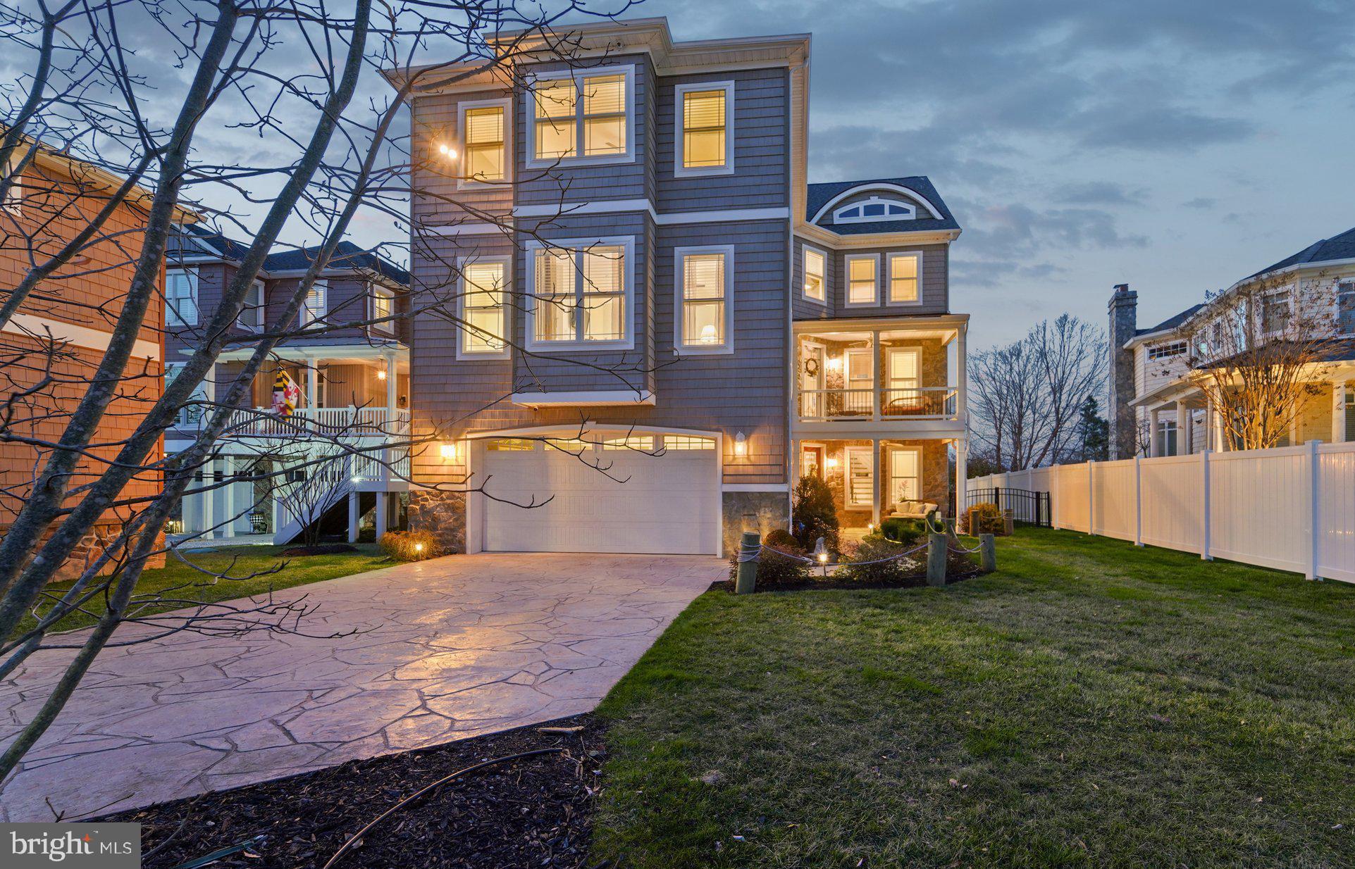 424 Katherine Avenue Baltimore, MD 21221 - Photo 65 of 77 a front view of a house with garden