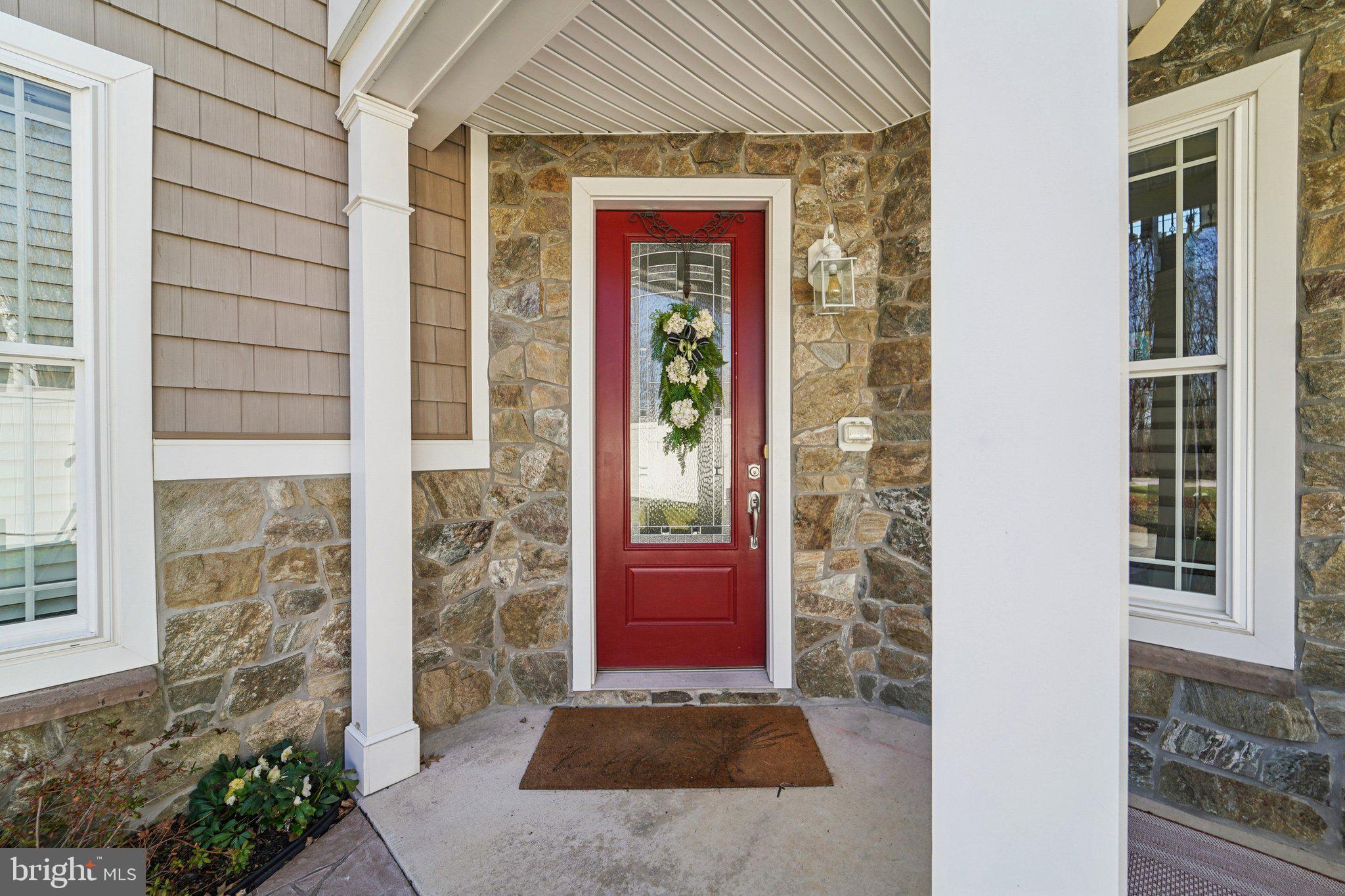 424 Katherine Avenue Baltimore, MD 21221 - Photo 7 of 77 a front view of a house with a red gate