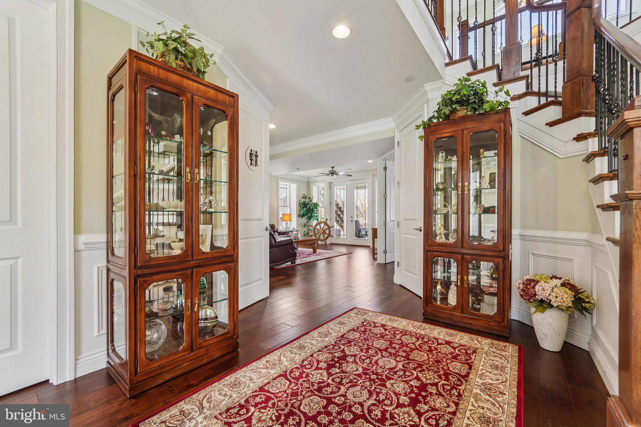 424 Katherine Avenue Baltimore, MD 21221 - Photo 9 of 77 a view of an entryway with wooden floor and a rug
