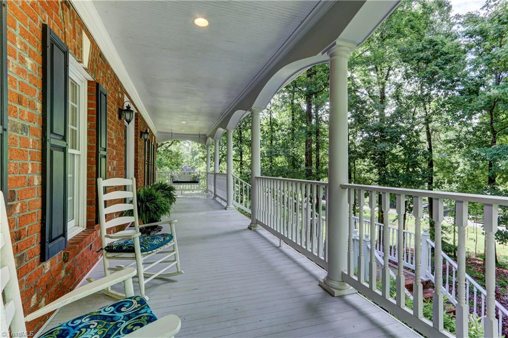 8526 Rosedale Drive Oak Ridge, NC 27310 - Photo 2 of 30 Welcoming front porch