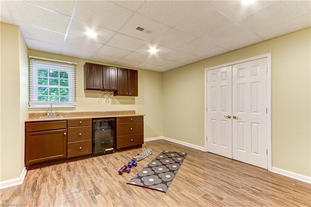 8526 Rosedale Drive Oak Ridge, NC 27310 - Photo 24 of 30 Basement exercise/playroom