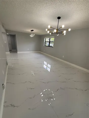a view of a livingroom with a fireplace