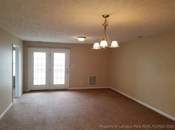 a view of a room with a large window