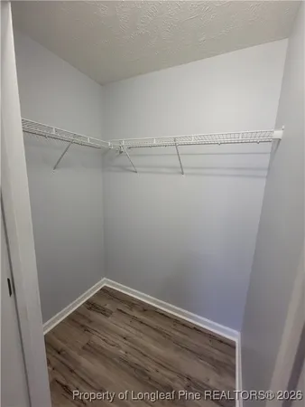 a view of a room with racks on the wall