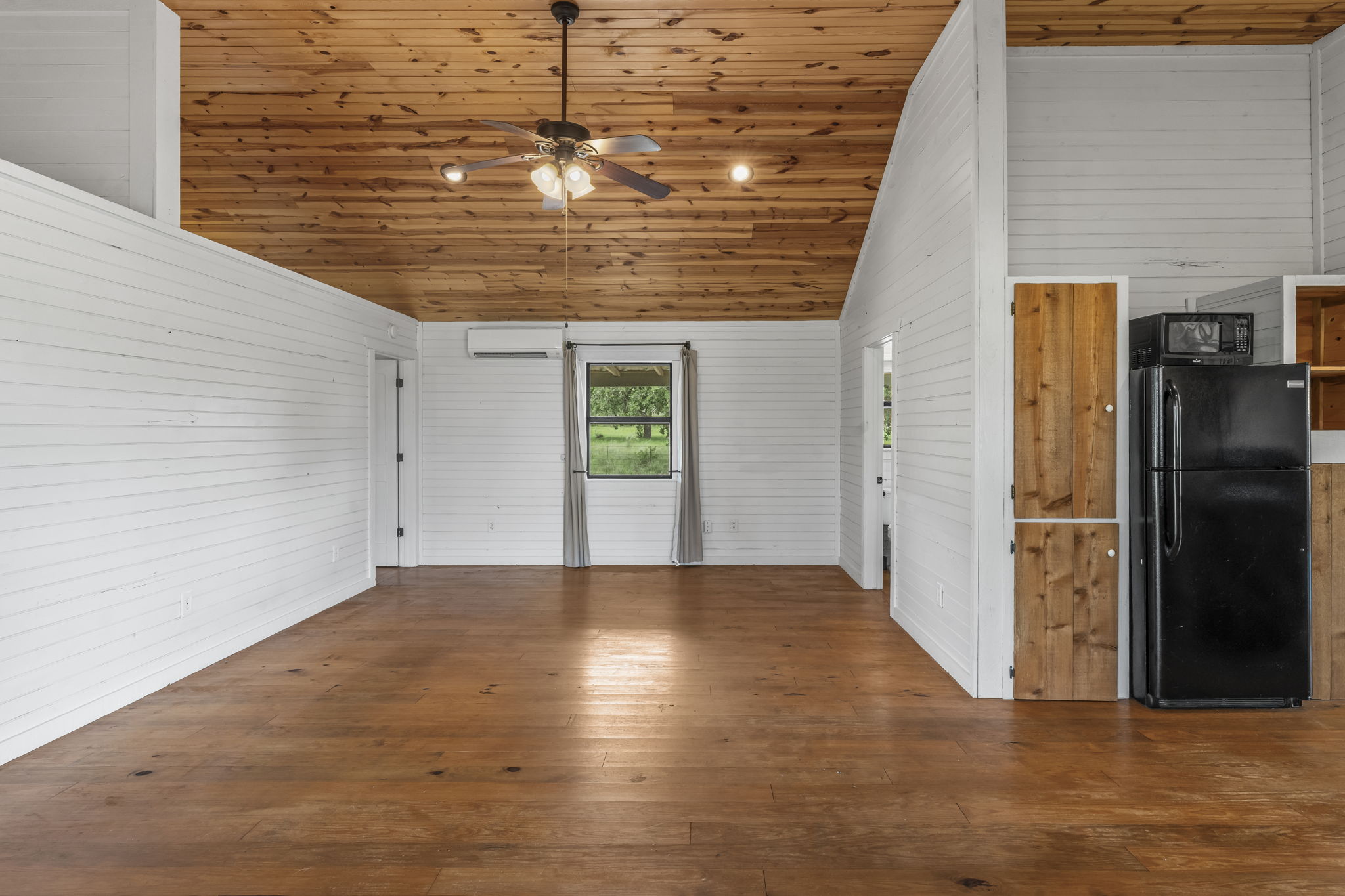 225 Ischar Lane Mason, TX 76856 - Photo 8 of 37 a view of empty room with wooden floor