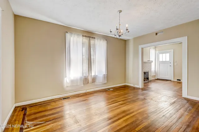 a kitchen with a refrigerator sink and microwave