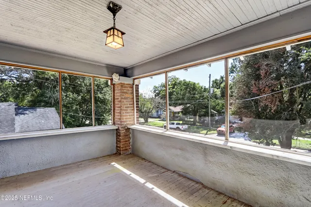 a white refrigerator freezer and a stove sitting inside of a kitchen
