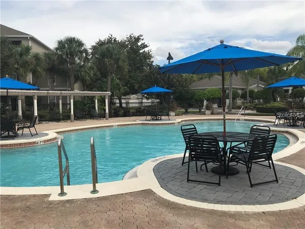 a view of a house with backyard porch and patio