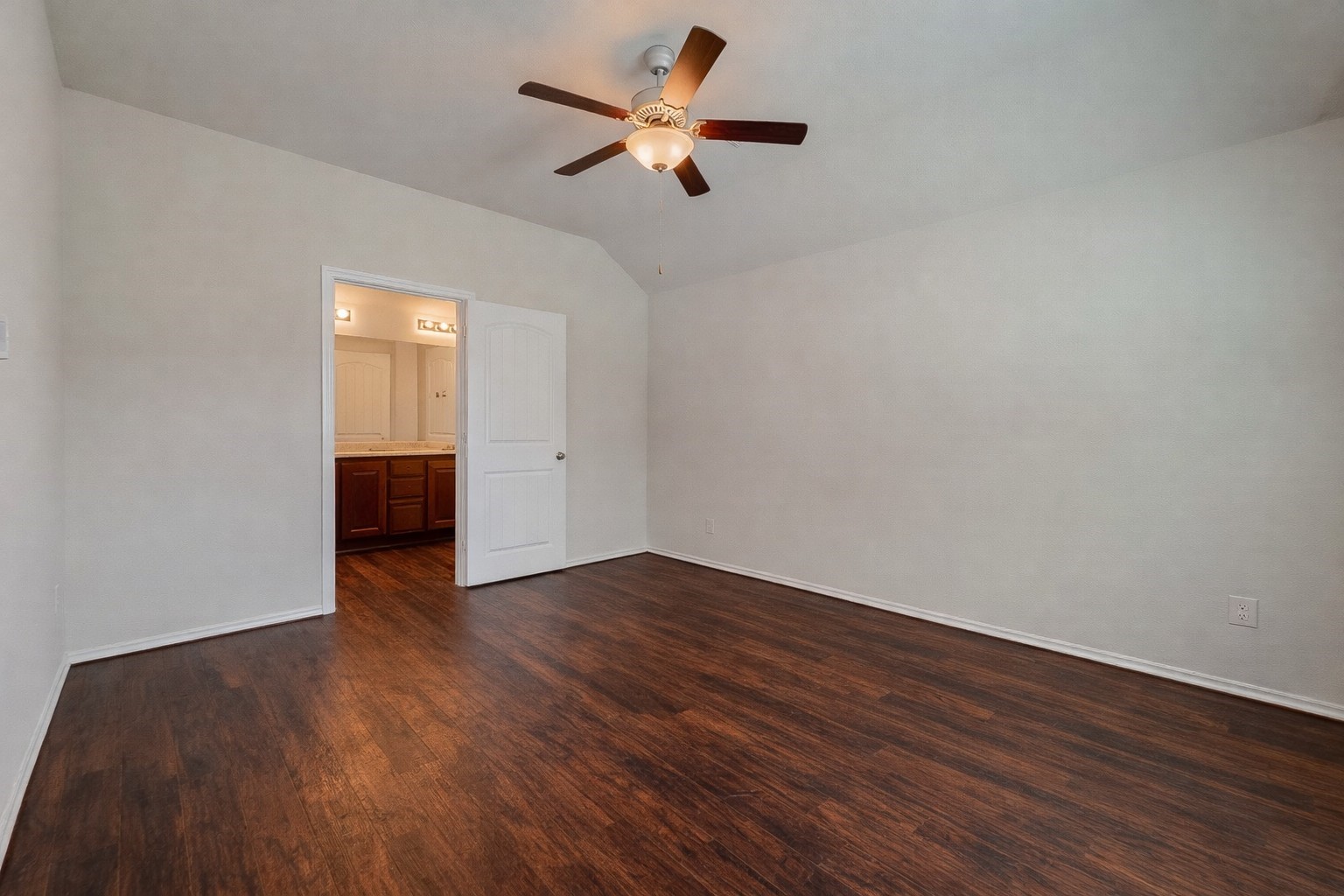25911 Rustical Road Katy, TX 77493 - Photo 28 of 40 wooden floor in an empty room with a window