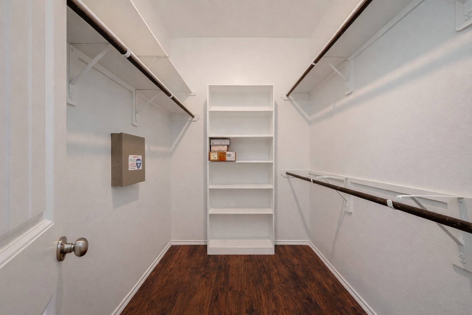 25911 Rustical Road Katy, TX 77493 - Photo 30 of 40 a view of walk in closet with empty racks