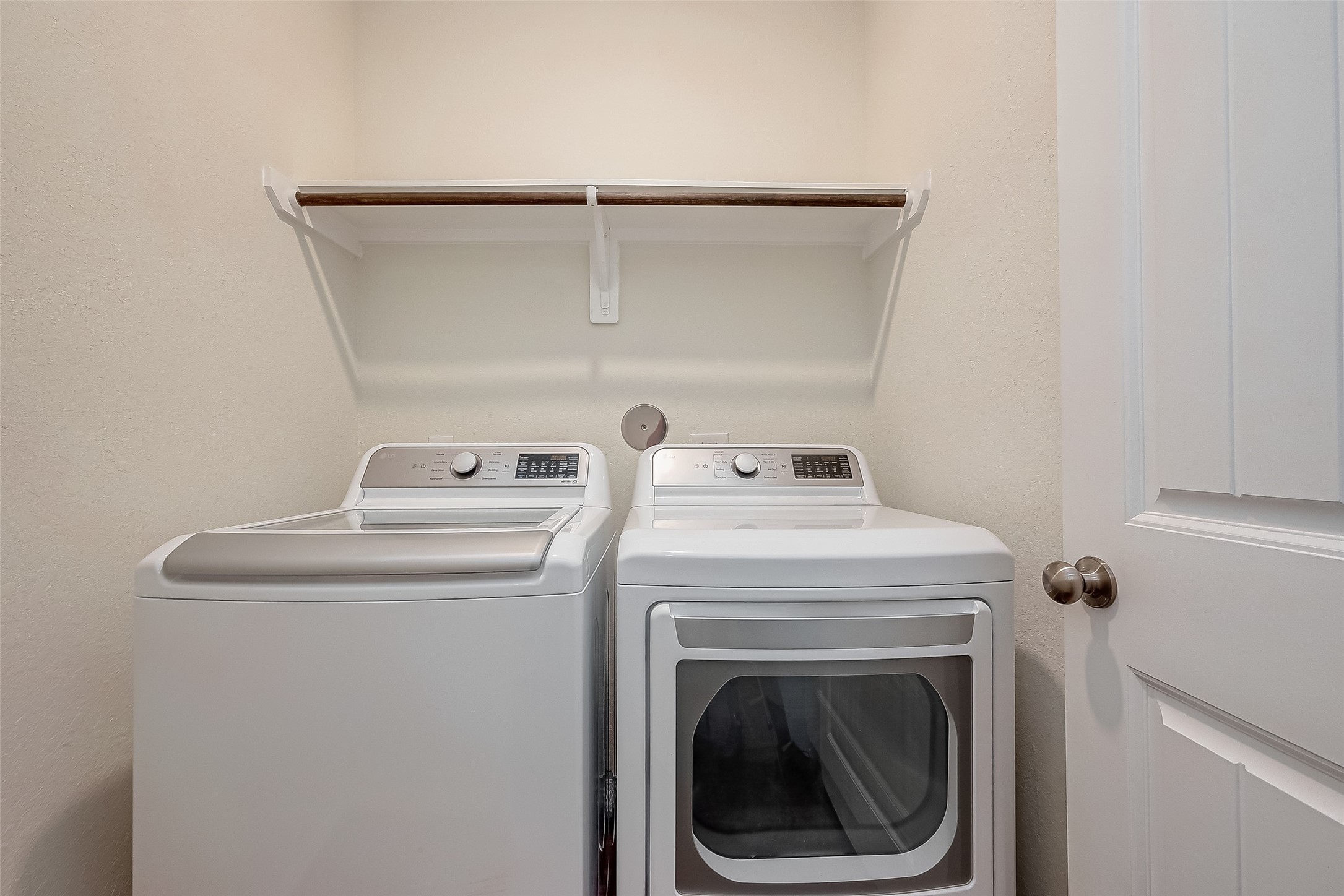 25911 Rustical Road Katy, TX 77493 - Photo 34 of 40 a utility room with dryer and washer