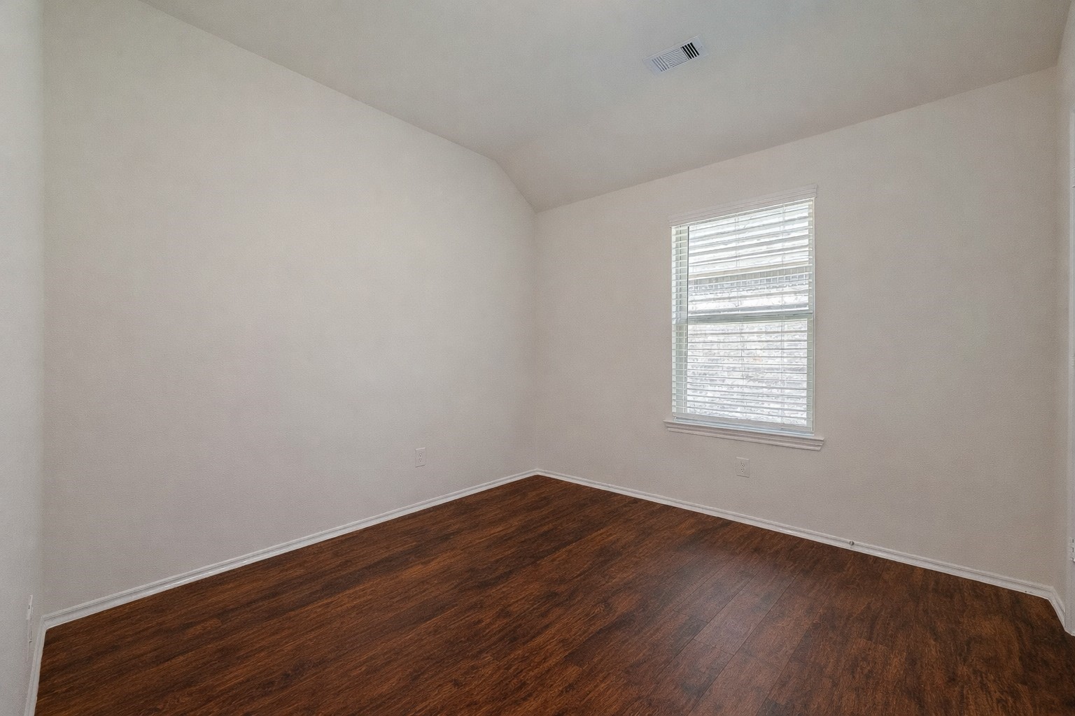 25911 Rustical Road Katy, TX 77493 - Photo 35 of 40 an empty room with wooden floor and windows