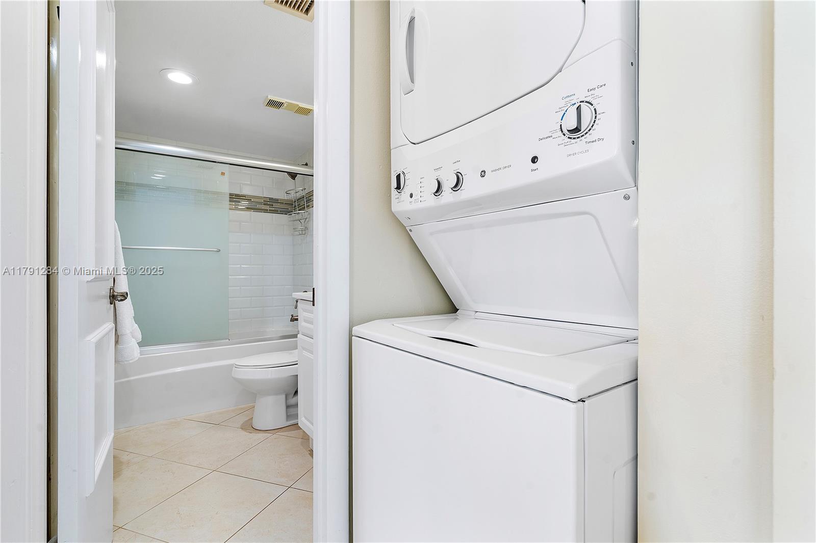 400 Ocean Trail Way, Unit 302 Jupiter, FL 33477 - Photo 20 of 34 a bathroom with a toilet sink and shower