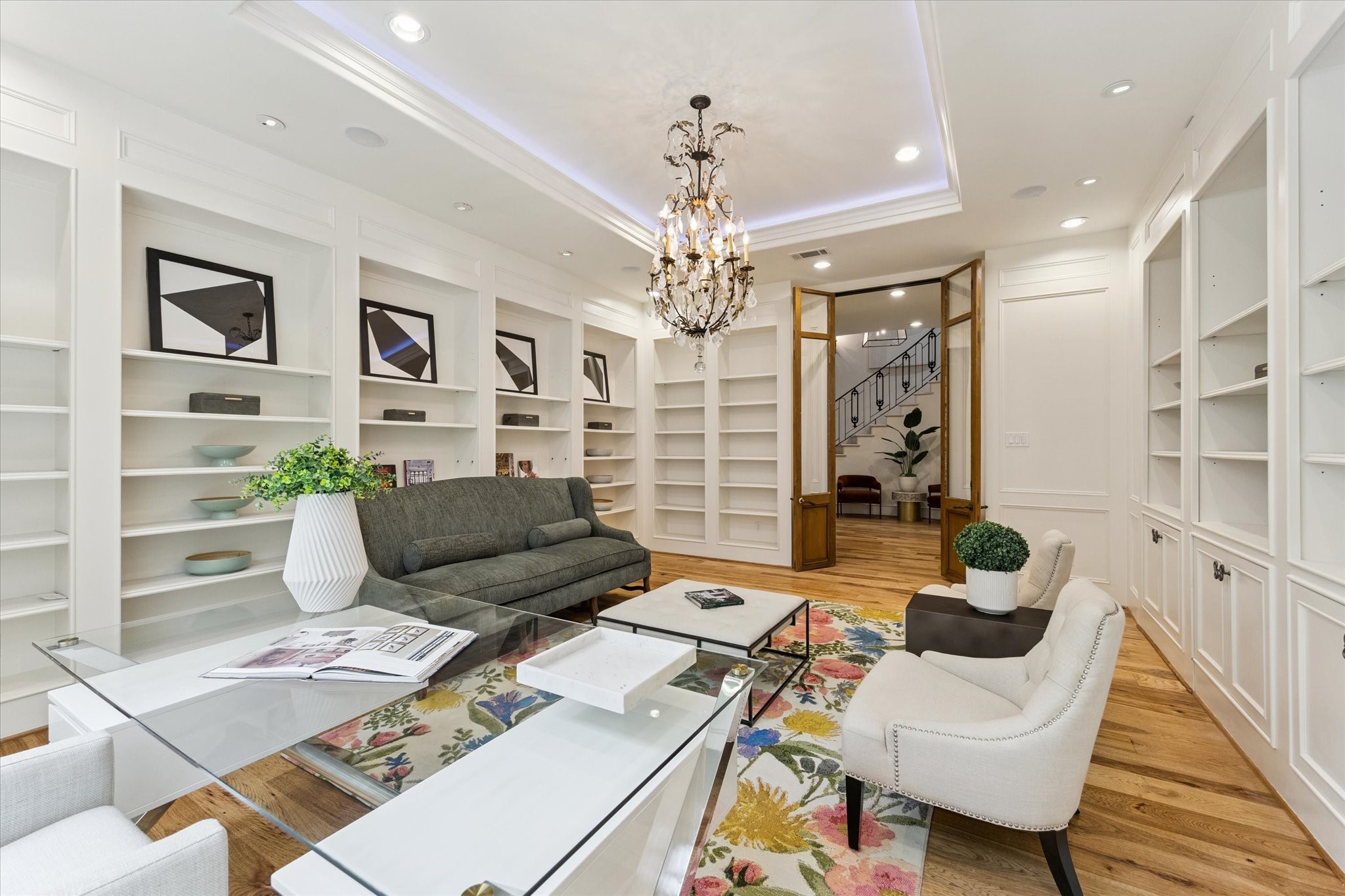 5309 Cherokee Street Houston, TX 77005 - Photo 11 of 40 a living room with furniture and a chandelier