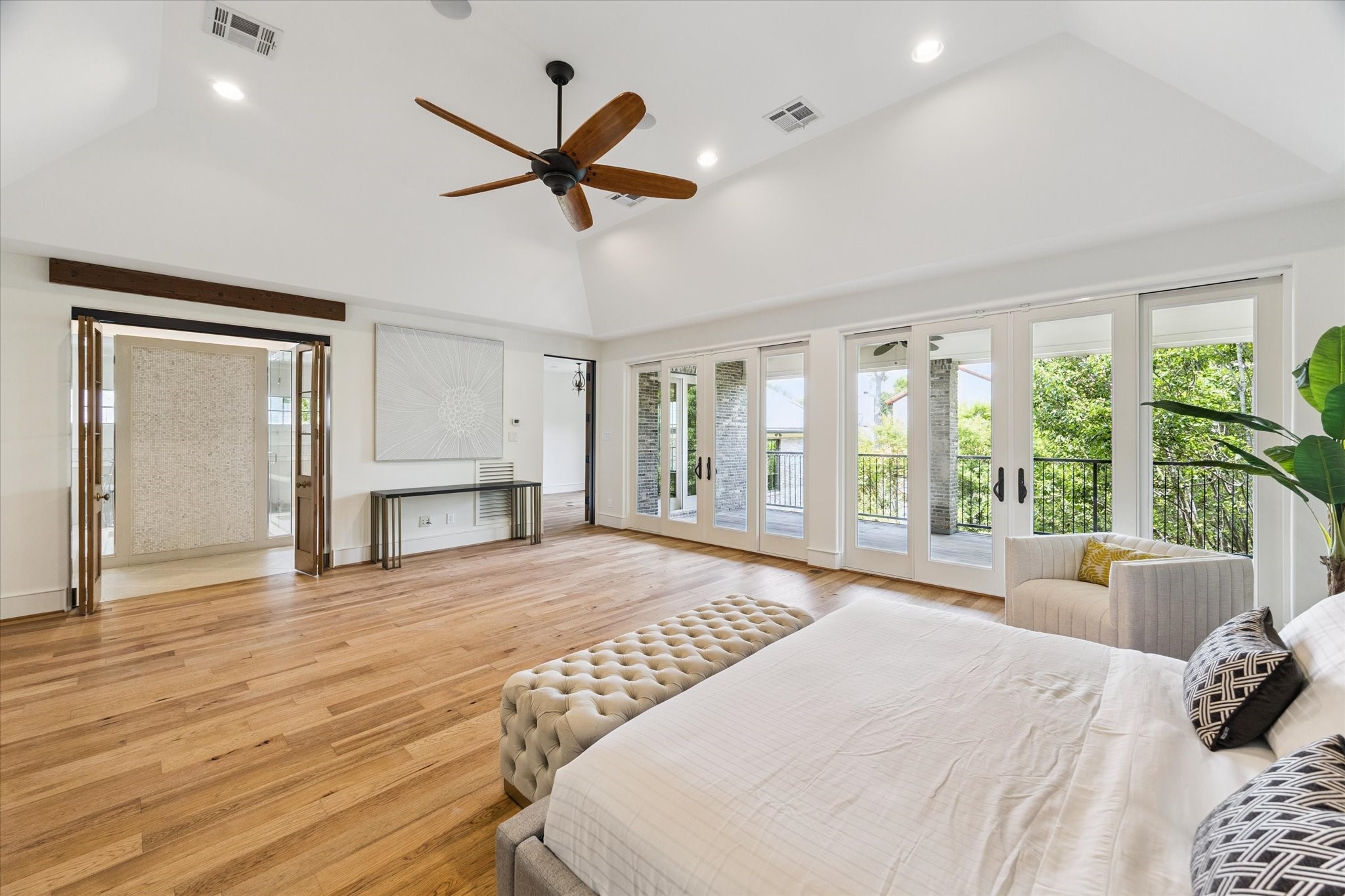 5309 Cherokee Street Houston, TX 77005 - Photo 13 of 40 a large bedroom with a large bed and a large window