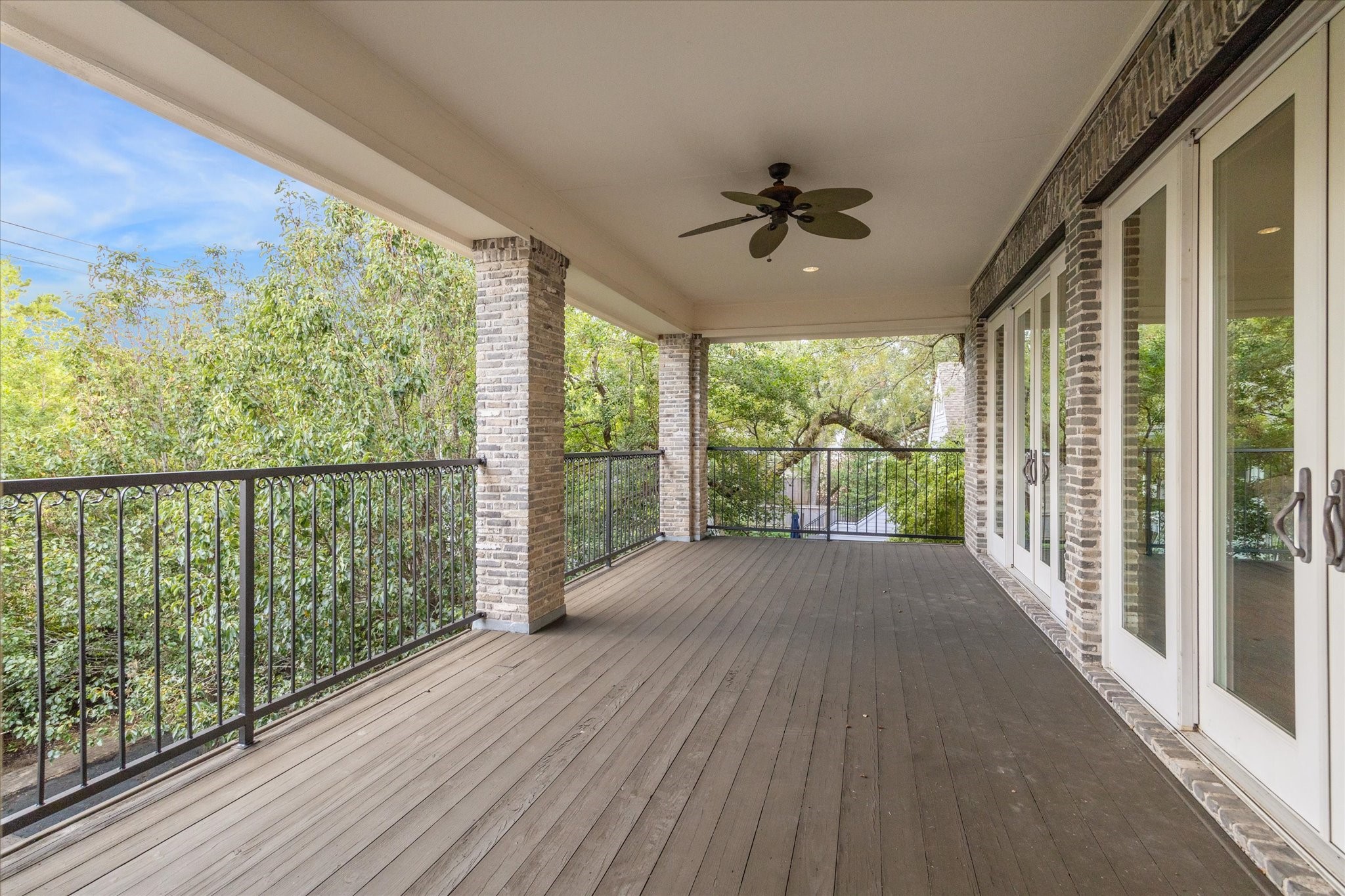 5309 Cherokee Street Houston, TX 77005 - Photo 16 of 40 a view of a porch with wooden floor and outdoor space