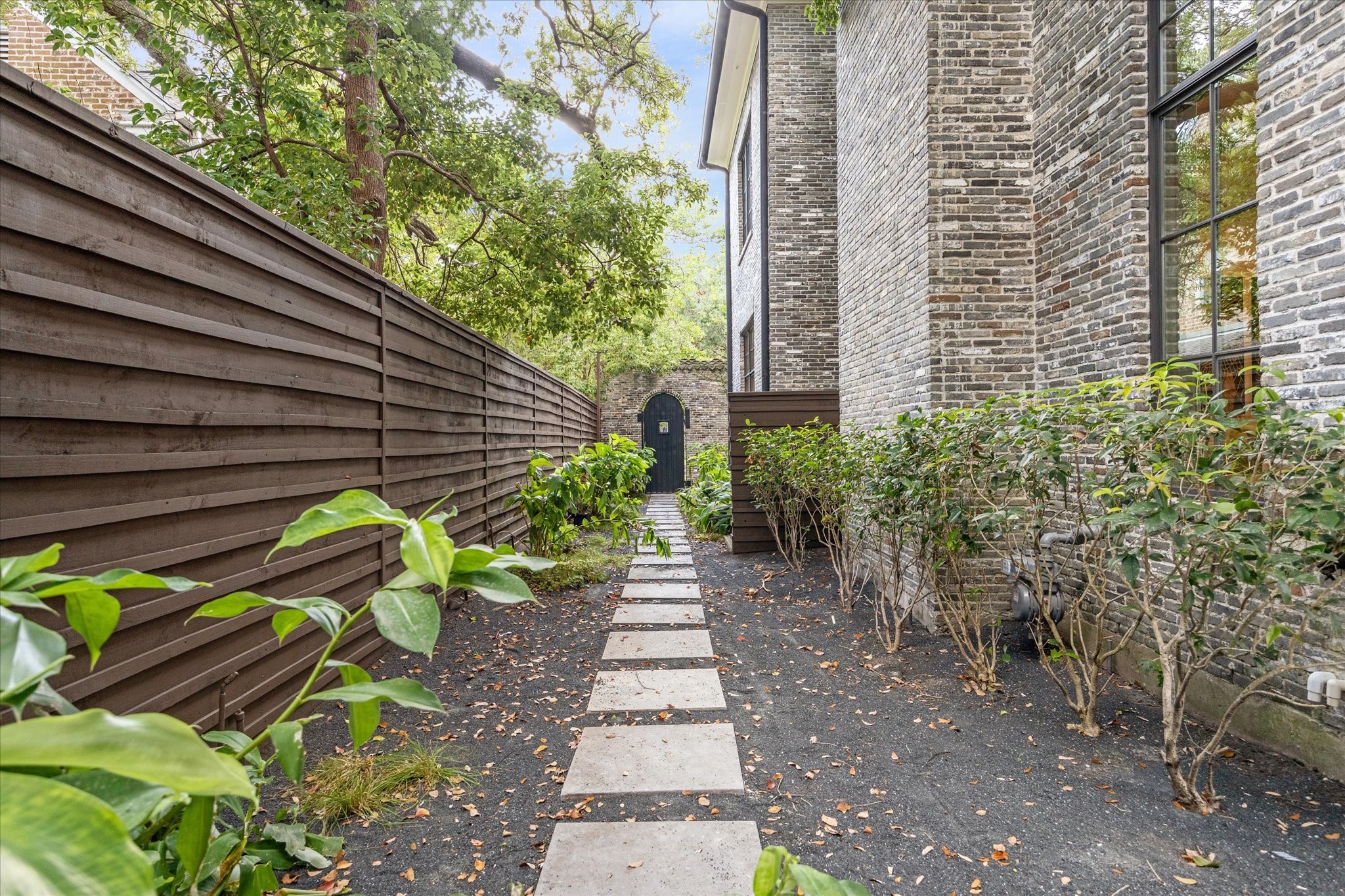 5309 Cherokee Street Houston, TX 77005 - Photo 23 of 40 a backyard of a house with lots of green space