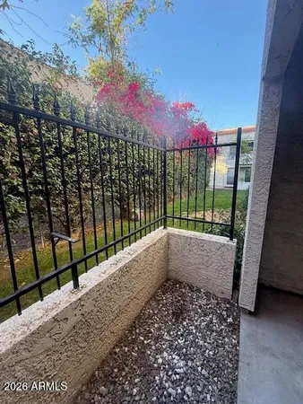 a view of house with swimming pool yard and outdoor seating