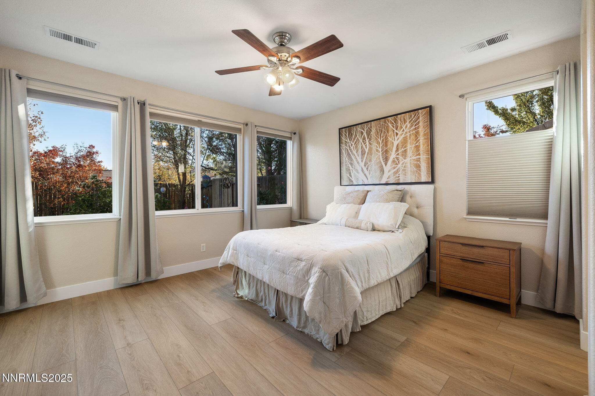 10560 Vista Alta Drive Reno, NV 89521 - Photo 14 of 25 a bedroom with a large bed and a window