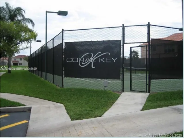 a sign board with a yard