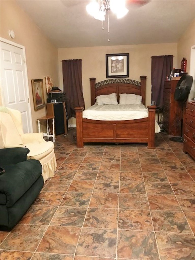 1188 Private 6030 Cameron, TX 76520 - Photo 16 of 28 Main bedroom which has a ceiling fan