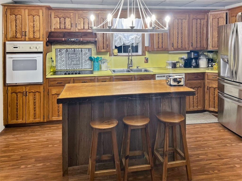 1188 Private 6030 Cameron, TX 76520 - Photo 7 of 28 a kitchen with a sink cabinets and window
