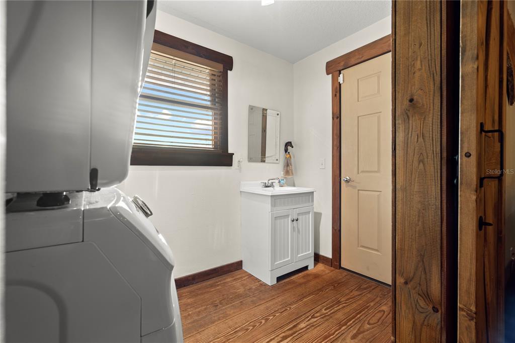 4292 Southwest 73rd Trail Bushnell, FL 33513 - Photo 14 of 88 a bathroom with a sink and a mirror