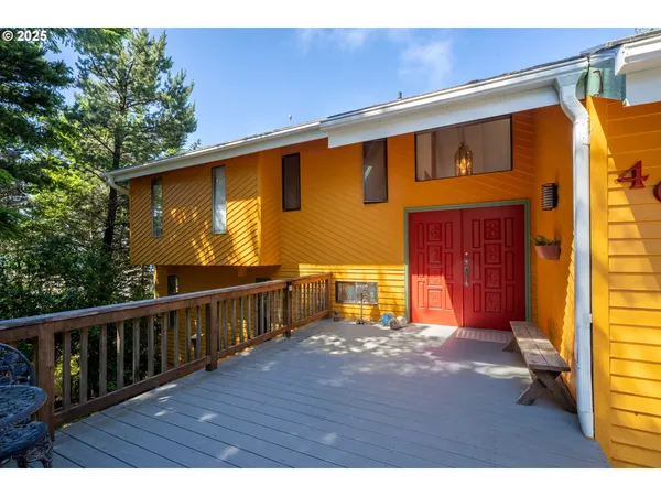 a balcony with wooden floor