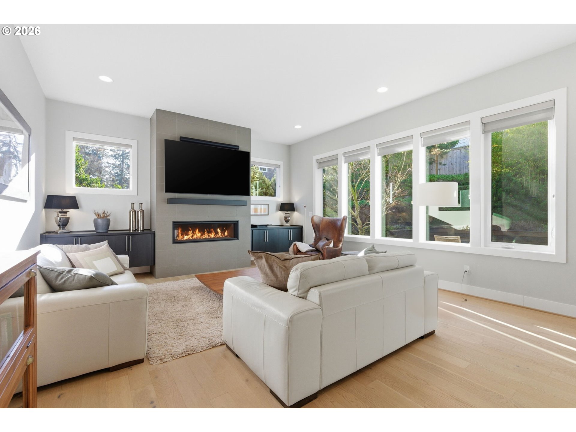 2123 South Military Road Portland, OR 97219 - Photo 12 of 47 a living room with furniture and a flat screen tv