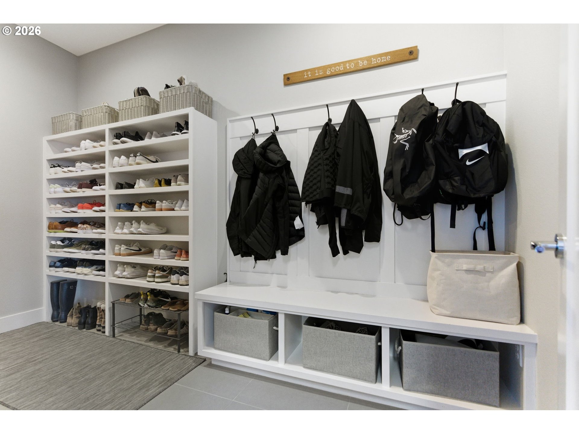 2123 South Military Road Portland, OR 97219 - Photo 35 of 47 a view of walk in closet with clothes and shoes